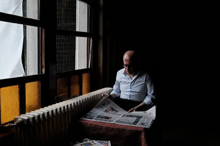 Man reading a news paper