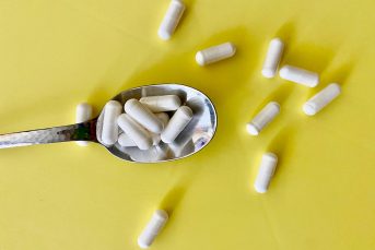 Capsules on a spoon